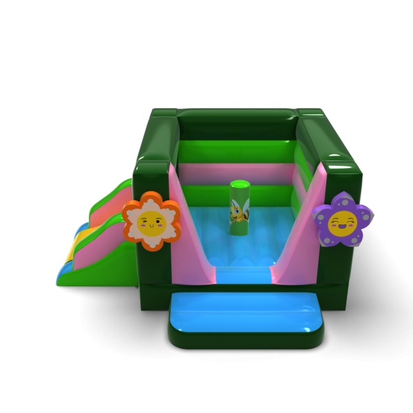 Small enclosed inflatable castle with slide - in the spring theme