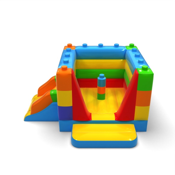 Small enclosed inflatable castle with slide - in the colorful blocks theme
