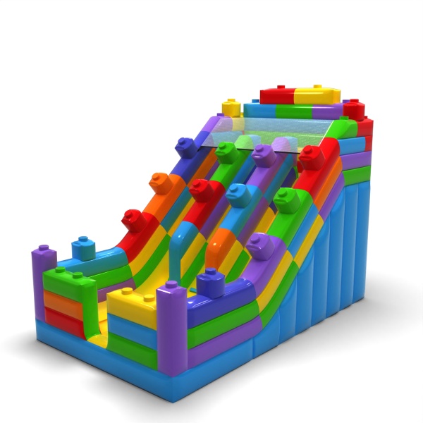 Double inflatable slide in the theme of colourful blocks